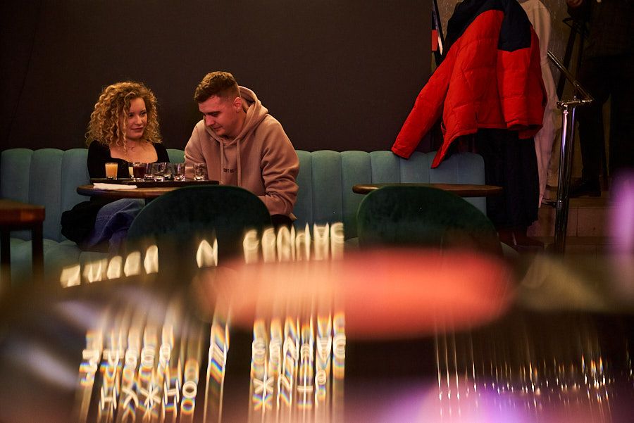 photo of people at bar party