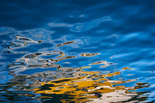 abstract photos of a boat's reflection