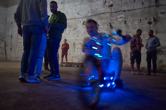 man on the bycicle at the rave party